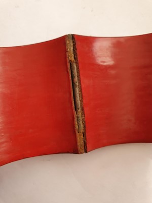 Lot 636 - A PAIR OF CHINESE CINNABAR RED LACQUER WRIST BANDS.