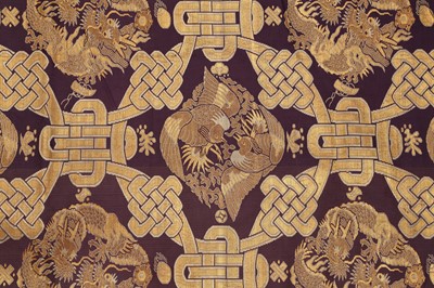Lot 559 - A JAPANESE KINRAN TEMPLE HANGING AND A ROLL OF BROCADE.