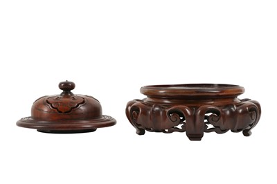 Lot 1073 - A CHINESE WOOD COVER AND STAND.