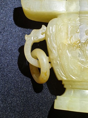 Lot 17 - A CHINESE YELLOW JADE VASE AND COVER.