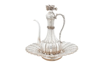 Lot 523 - A TURKISH SILVER EWER AND BASIN