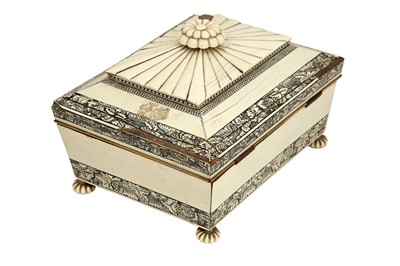 Lot 445 - λ AN ANGLO-INDIAN VIZAGAPATAM IVORY AND CARVED SANDALWOOD SEWING BOX