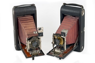 Lot 99 - Three Folding Maroon Bellows Cameras.