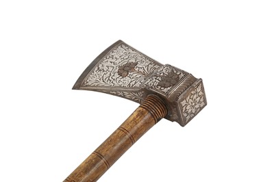 Lot 435 - A SILVER AND COPPER-INLAID STEEL SADDLE-AXE HEAD (TABARZIN)