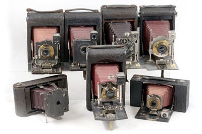 Lot 85 - Group of Seven Kodak & Other Red Bellows Cameras.
