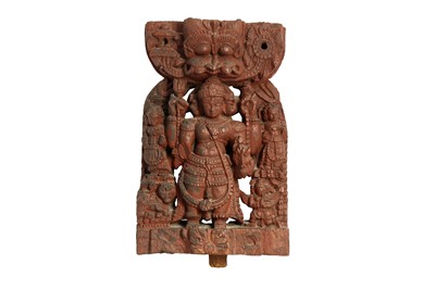 Lot 454 - A CARVED WOOD PANEL WITH THE HINDU GOD SHIVA