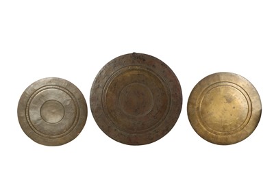 Lot 463 - THREE COPPER AND SILVER-INLAID TANJORE TRAYS