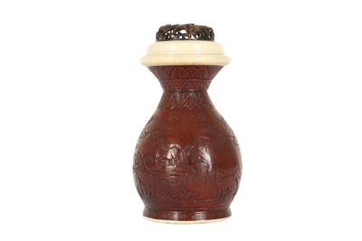 Lot 165 - λ A CHINESE MOULDED GOURD 'EIGHT HORSES OF WANG MU' CRICKET CAGE.