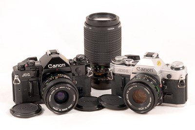 Lot 261 - Canon A-1 & AE-1 Outfit.