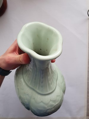 Lot 190 - A CHINESE CELADON-GLAZED 'BATS AND PEACHES' VASE.