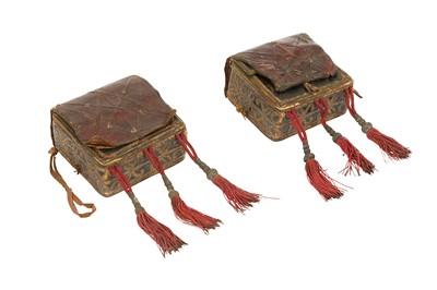 Lot 428 - TWO OTTOMAN TOOLED LEATHER CARTRIDGE CASES WITH TASSELS