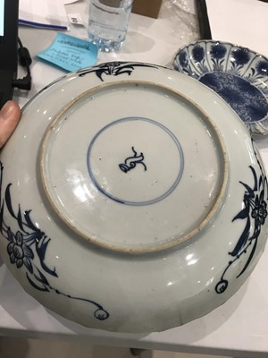 Lot 275 - A NEAR-PAIR OF CHINESE BLUE AND WHITE DISHES.