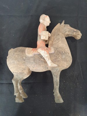 Lot 154 - TWO CHINESE POTTERY HORSES AND RIDERS.