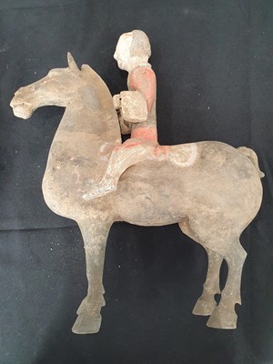 Lot 154 - TWO CHINESE POTTERY HORSES AND RIDERS.