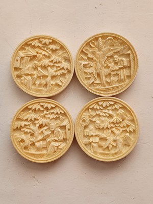 Lot 853 - λ A SET OF CHINESE CANTON CARVED IVORY BACKGAMMON COUNTERS.
