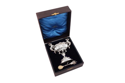 Lot 588 - A cased Victorian sterling silver standing salt and spoon, London 1893 by Carrington & Co