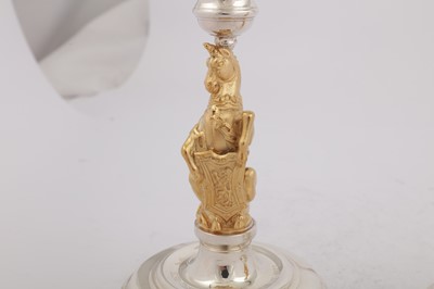Lot 546 - A cased pair of Elizabeth II parcel gilt sterling silver commemorative candlesticks, London 1977 by Garrard and Co