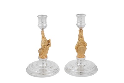 Lot 546 - A cased pair of Elizabeth II parcel gilt sterling silver commemorative candlesticks, London 1977 by Garrard and Co