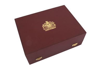 Lot 546 - A cased pair of Elizabeth II parcel gilt sterling silver commemorative candlesticks, London 1977 by Garrard and Co