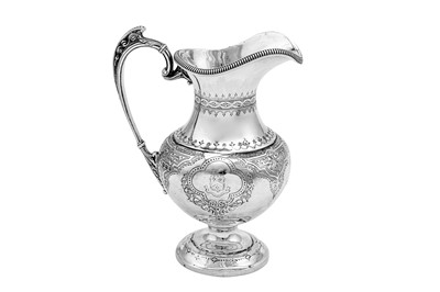 Lot 596 - A Victorian sterling silver milk jug, Birmingham 1870 by Horace Woodward & Co
