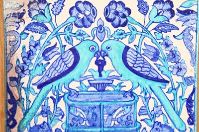 Lot 518 - A FRAMED TURQUOISE AND COBALT BLUE MULTAN POTTERY TILE WITH PARROTS