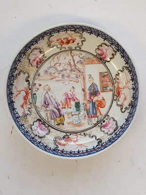 Lot 595 - A PAIR OF CHINESE FAMILLE ROSE FIGURATIVE SAUCER DISHES.
