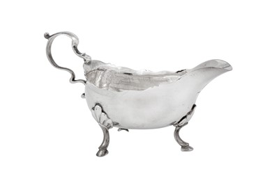 Lot 659 - A George III Irish sterling silver cream boat, Dublin circa 1760 probably by James Warren (active 1752-89)