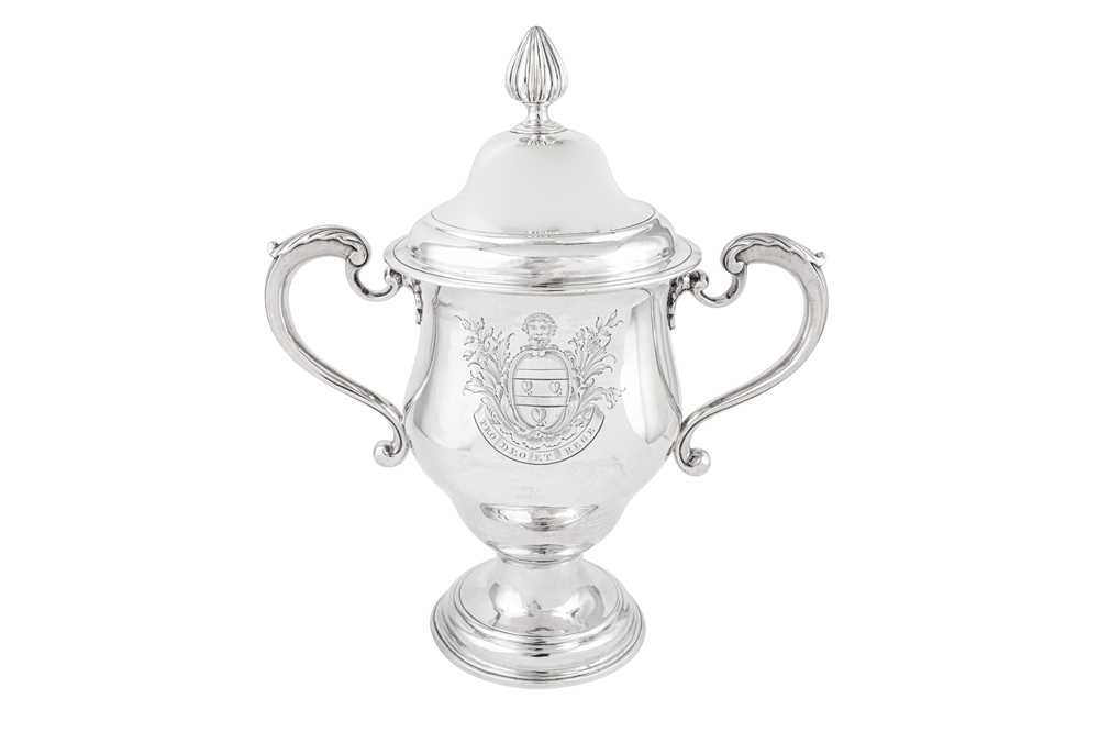 Lot 690 - A George III sterling silver cup and cover, London 1767 by James Baker (probably)