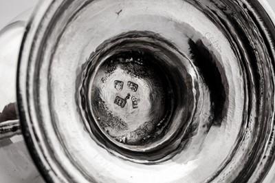 Lot 690 - A George III sterling silver cup and cover, London 1767 by James Baker (probably)