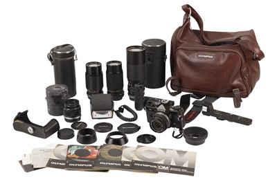 Lot 161 - An Olympus OM 2 SLR Outfit