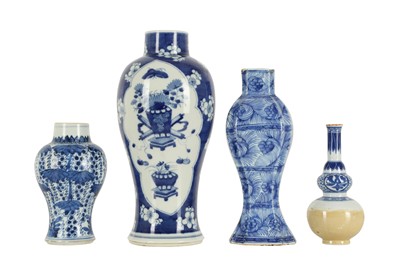 Lot 834 - FOUR CHINESE BLUE AND WHITE VASES.