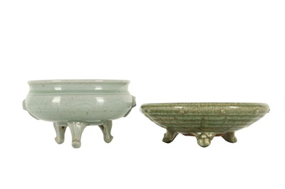 Lot 1056 - TWO CHINESE CELADON-GLAZED TRIPOD INCENSE BURNERS.