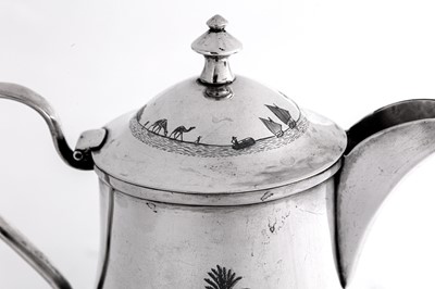 Lot 371 - An early 20th century Iraqi silver and niello coffee pot, Omara circa 1930 signed Barakat