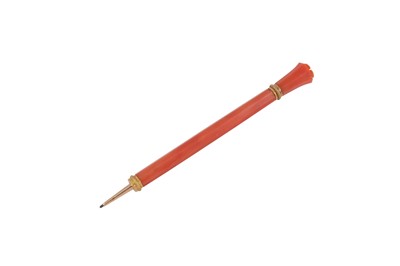 Lot 118 - A late 19th century 14 carat gold mounted coral propelling pencil, English or American circa 1890