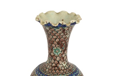 Lot 497 - A SOUVENIR FROM KUTAHYA: A FRILLED-RIM POTTERY VASE