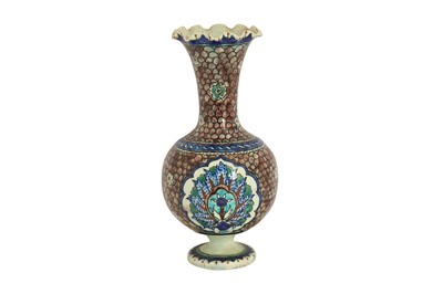 Lot 1085 - A SOUVENIR FROM KUTAHYA: A FRILLED-RIM POTTERY VASE
