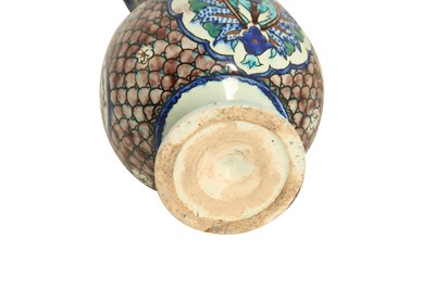 Lot 497 - A SOUVENIR FROM KUTAHYA: A FRILLED-RIM POTTERY VASE