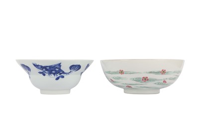 Lot 359 - A CHINESE BLUE AND WHITE 'FISH' BOWL AND A FAMILLE ROSE 'PRUNUS' BOWL.