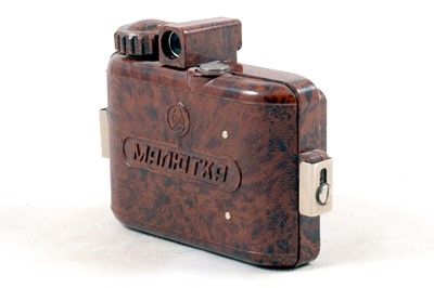 Lot 290 - Rare GOMZ Malutka (Tiny) Speckled Brown Sub-Miniature Bakelite Camera.