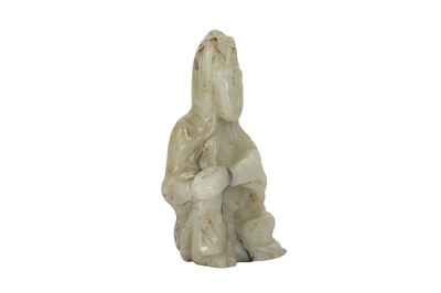 Lot 369 - A CHINESE PALE CELADON JADE FIGURE OF GUANYIN.