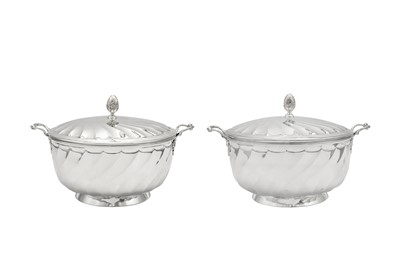 Lot 567 - A pair of George V sterling silver vegetable tureens (légumier), London 1930 by Levi & Salaman