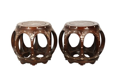Lot 658 - A PAIR OF HARDWOOD MOTHER OF PEARL-INLAID BARREL STOOLS.