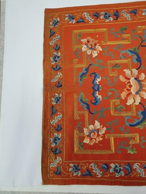 Lot 381 - A PAIR OF CHINESE EMBROIDERED RED-GROUND CHAIR COVERS.