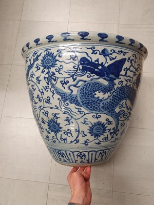 Lot 335 - A LARGE IMPERIAL CHINESE BLUE AND WHITE 'DRAGON' FISH BOWL.