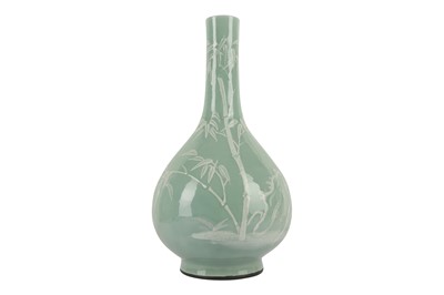 Lot 145 - A LARGE CHINESE SLIP-DECORATED CELADON PEAR-SHAPED VASE.