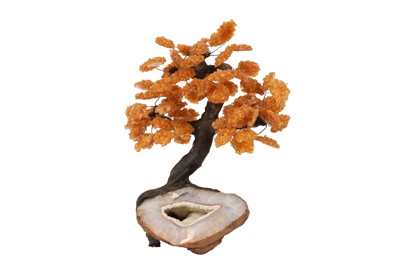 Lot 342 - AN AGATE GEODE AND CITRINE MODEL OF A TREE IN BLOSSOM