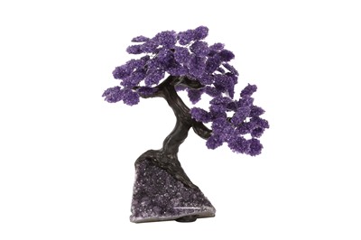 Lot 343 - AN AMETHYST GEODE AND AMETHYST CHIP MODEL OF A TREE IN BLOSSOM