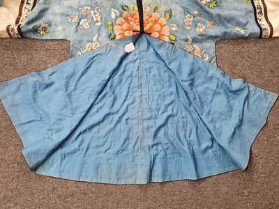 Lot 294 - A CHINESE PALE BLUE GROUND LADY'S ROBE.