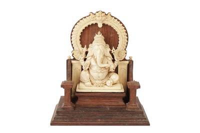 Lot 602 - λ AN INDIAN IVORY SCULPTURE OF GANESH, LATE 19TH/EARLY 20TH CENTURY