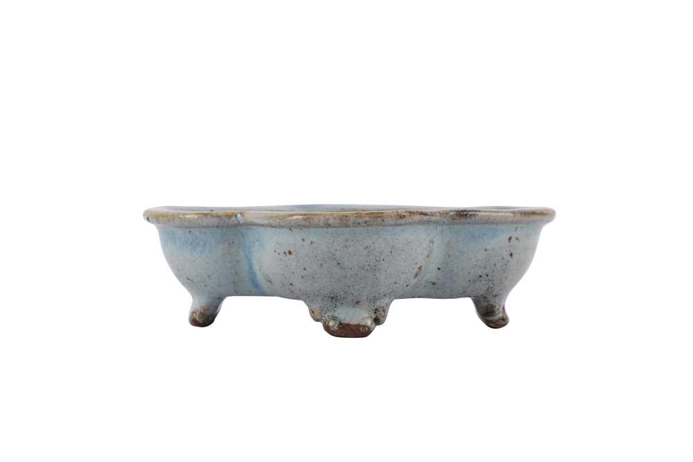 Lot 328 - A CHINESE JUN-TYPE QUATREFOIL WASHER.